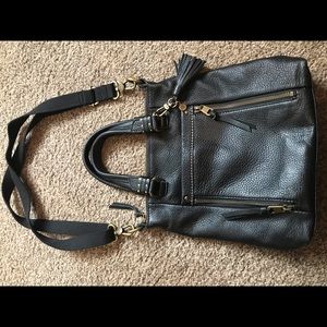 The Sak Black leather handbag in excellent cond.